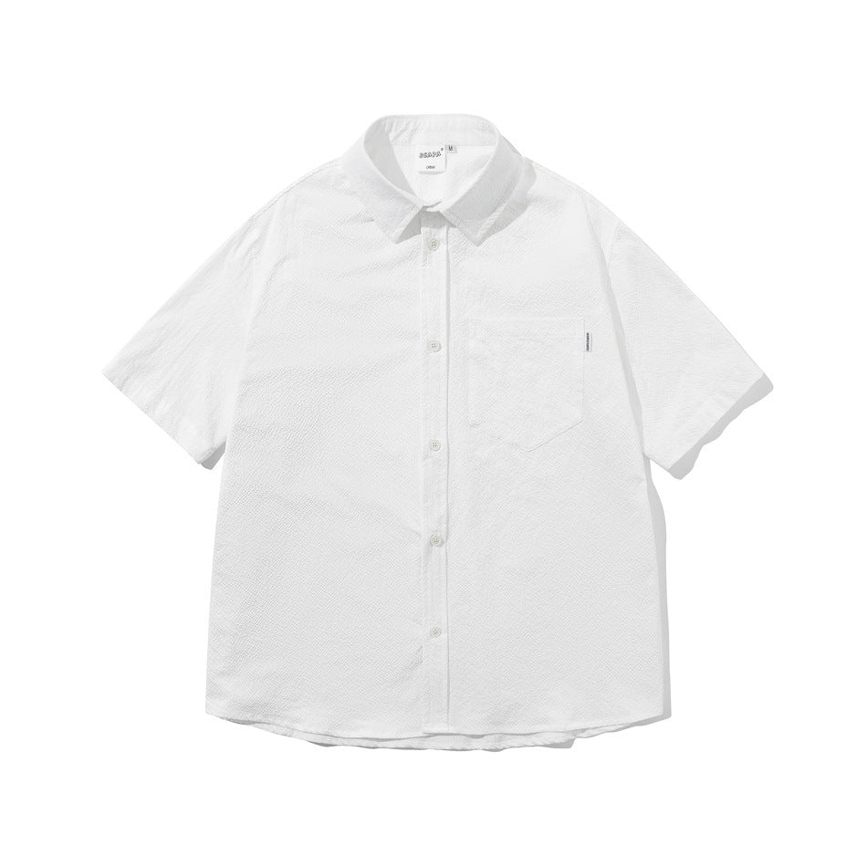 White short-sleeve button-up shirt with chest pocket and textured fabric, flat front view