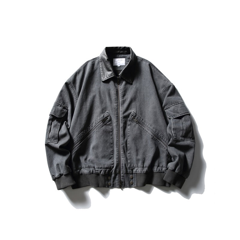 Gray washed-look zip jacket with collar, diagonal zip pockets, sleeve flap pockets and ribbed hem, flat lay front view