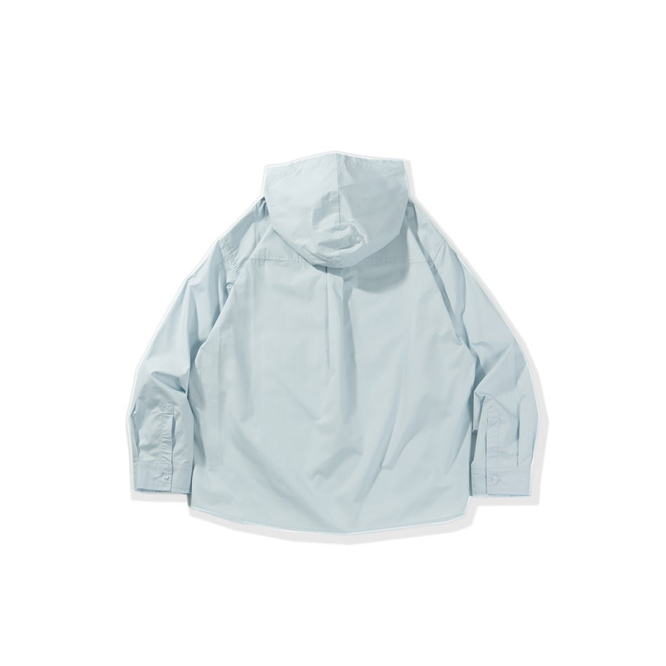 Back view of a pale blue hooded jacket with long sleeves and button cuffs, laid flat.