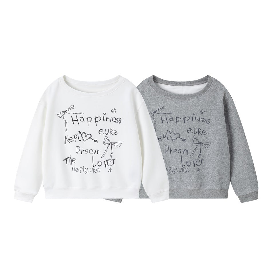 White and heather-gray crewneck sweatshirts shown from the front, each with a handwritten-style text and doodle print.