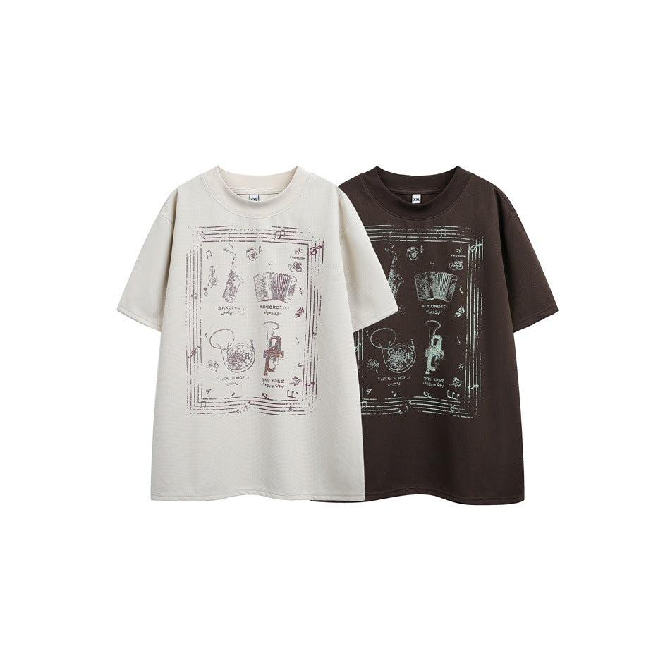 Ivory and brown short-sleeve T-shirts displayed side by side, each with a large musical-instrument graphic.