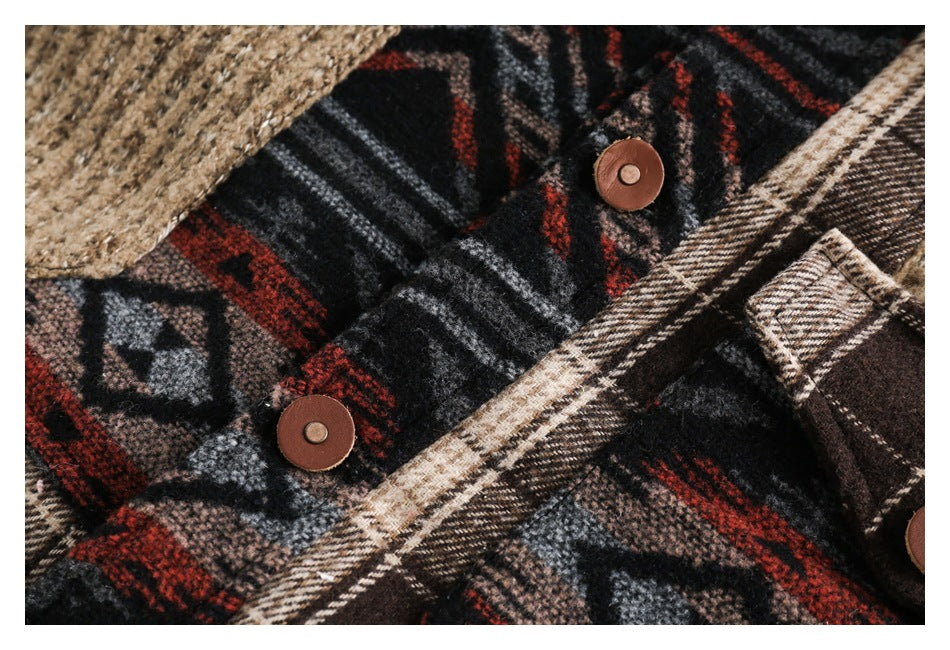 Close-up of the jacket's dark geometric-patterned fabric, brown buttons, and plaid trim.