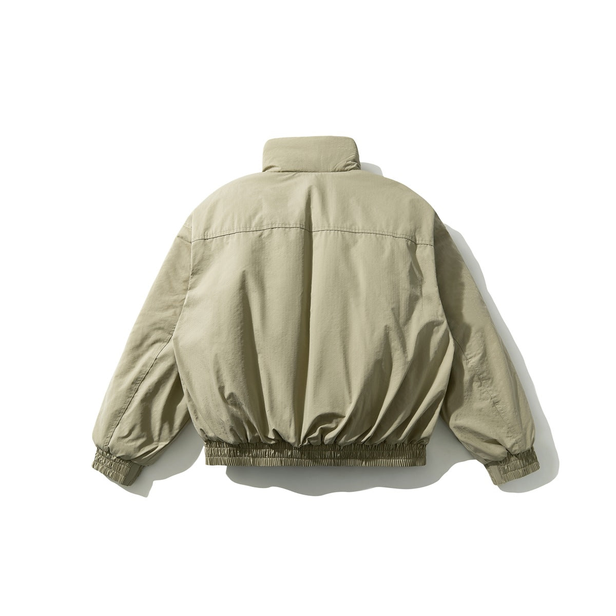 Back view of an olive-beige jacket with a stand collar and gathered cuffs and hem.