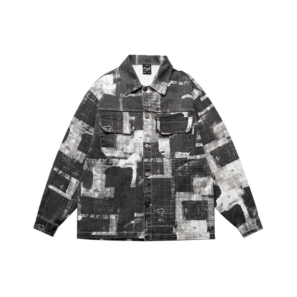 Black, gray and white abstract printed button-front jacket with chest flap pockets, flat lay front view