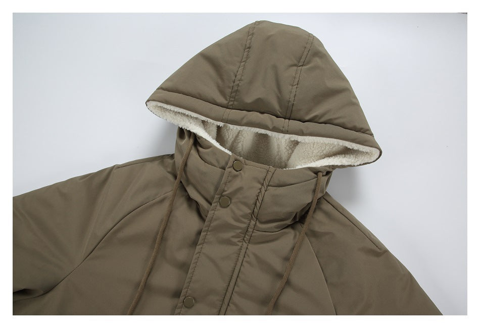Close-up of the jacket's taupe hood, cream lining, drawcords and snap-button placket.