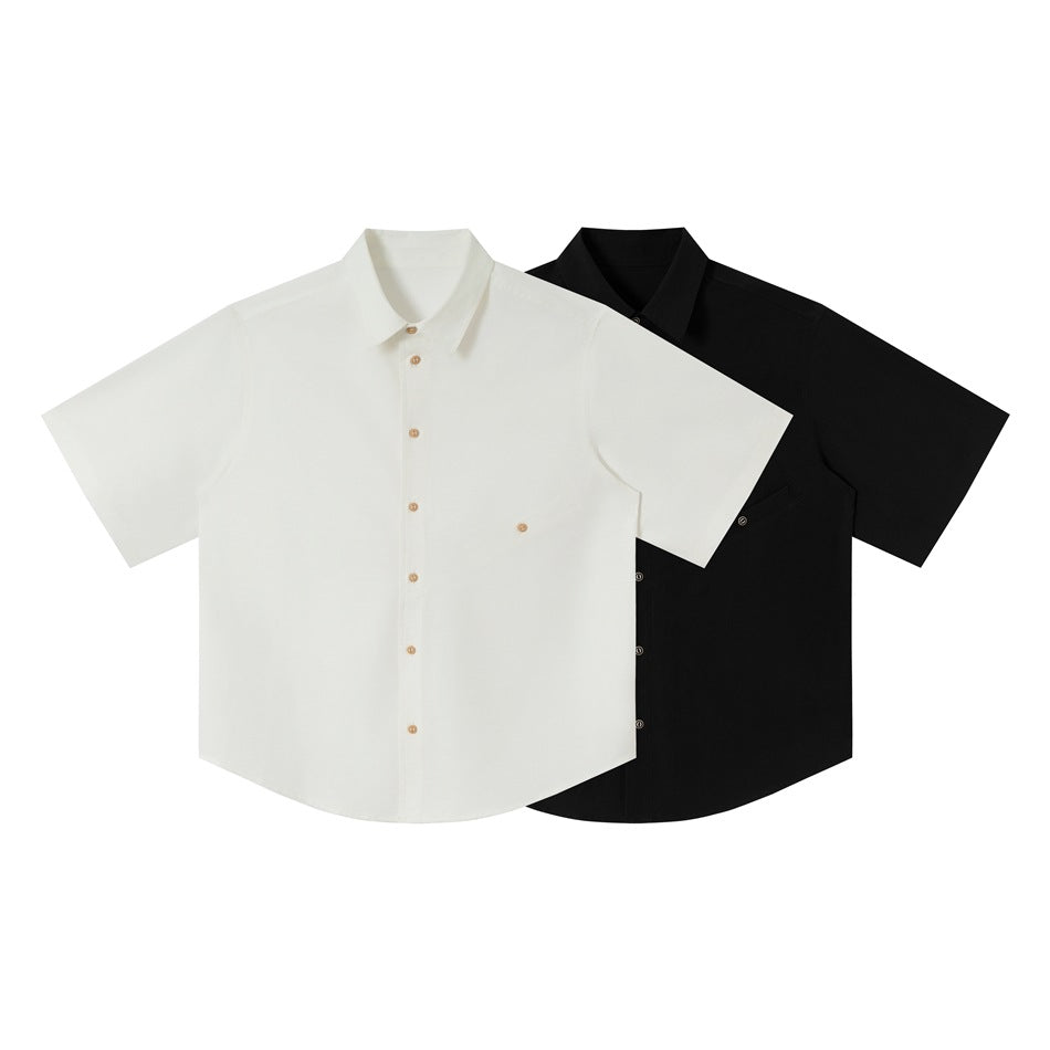 Off-white and black short-sleeve button-up shirts shown from the front.