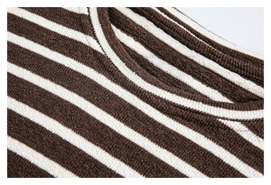 Close-up of brown-and-cream striped knit fabric and the ribbed neckline of a top.