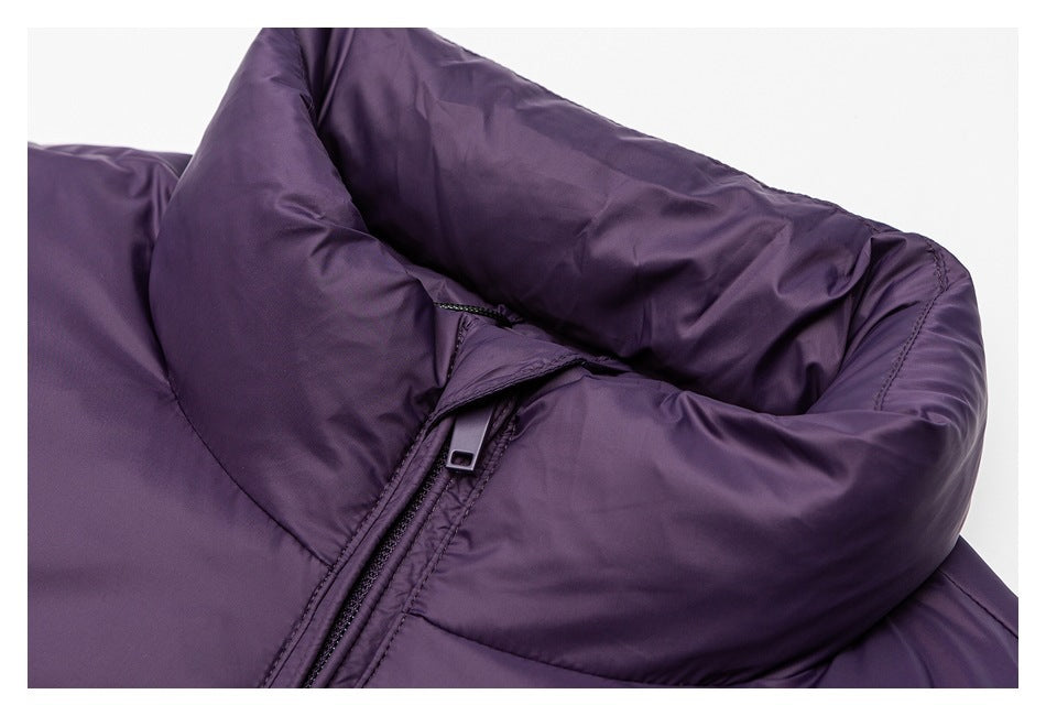 Close-up of the purple padded jacket's high collar and front zipper.