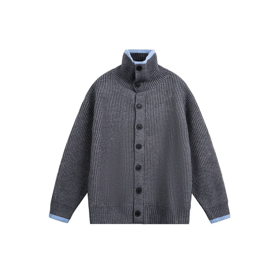 Gray ribbed-knit button-front cardigan with stand collar and light blue trim on collar and cuffs, flat lay