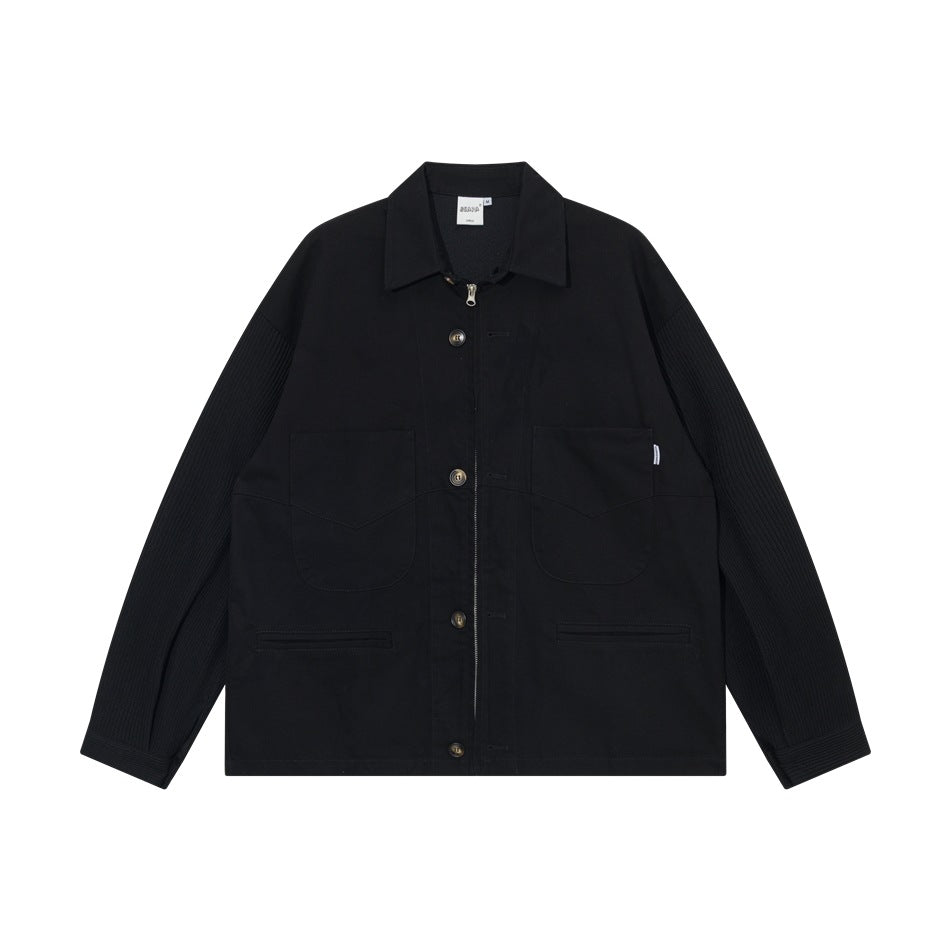 Black collared jacket with zipper and button front, large chest patch pockets and ribbed sleeves