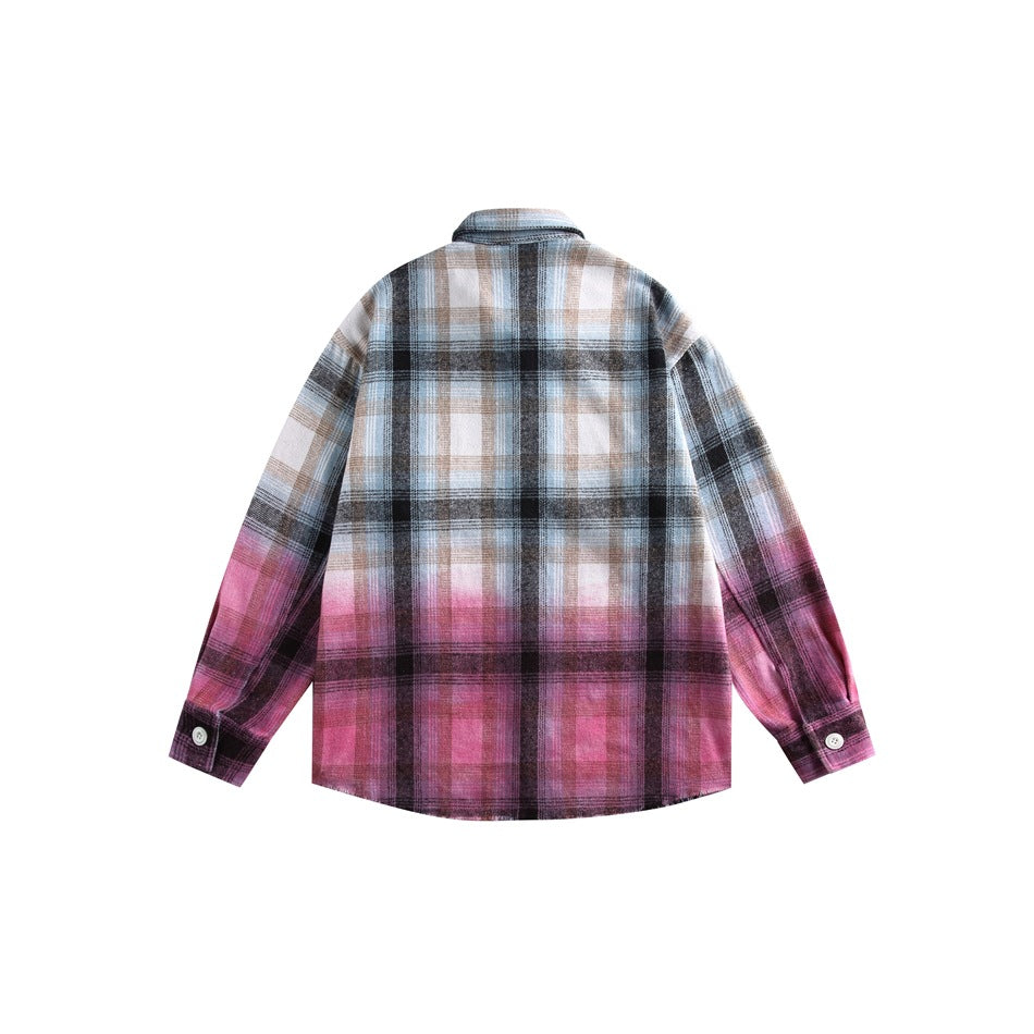 Back view of a long-sleeved plaid shirt with blue, gray and beige checks fading to pink toward the hem and cuffs.