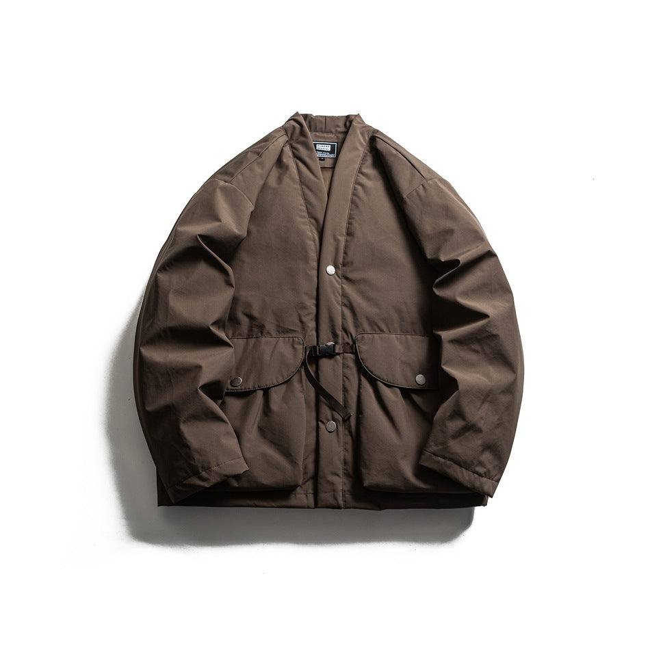 Brown padded jacket with open V-neck, snap buttons, two flap pockets and waist buckle strap, flat view