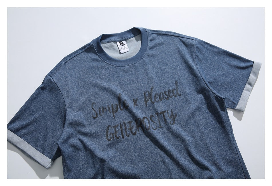 Blue short-sleeve T-shirt laid flat, with gray sleeve cuffs and dark English text across the chest.