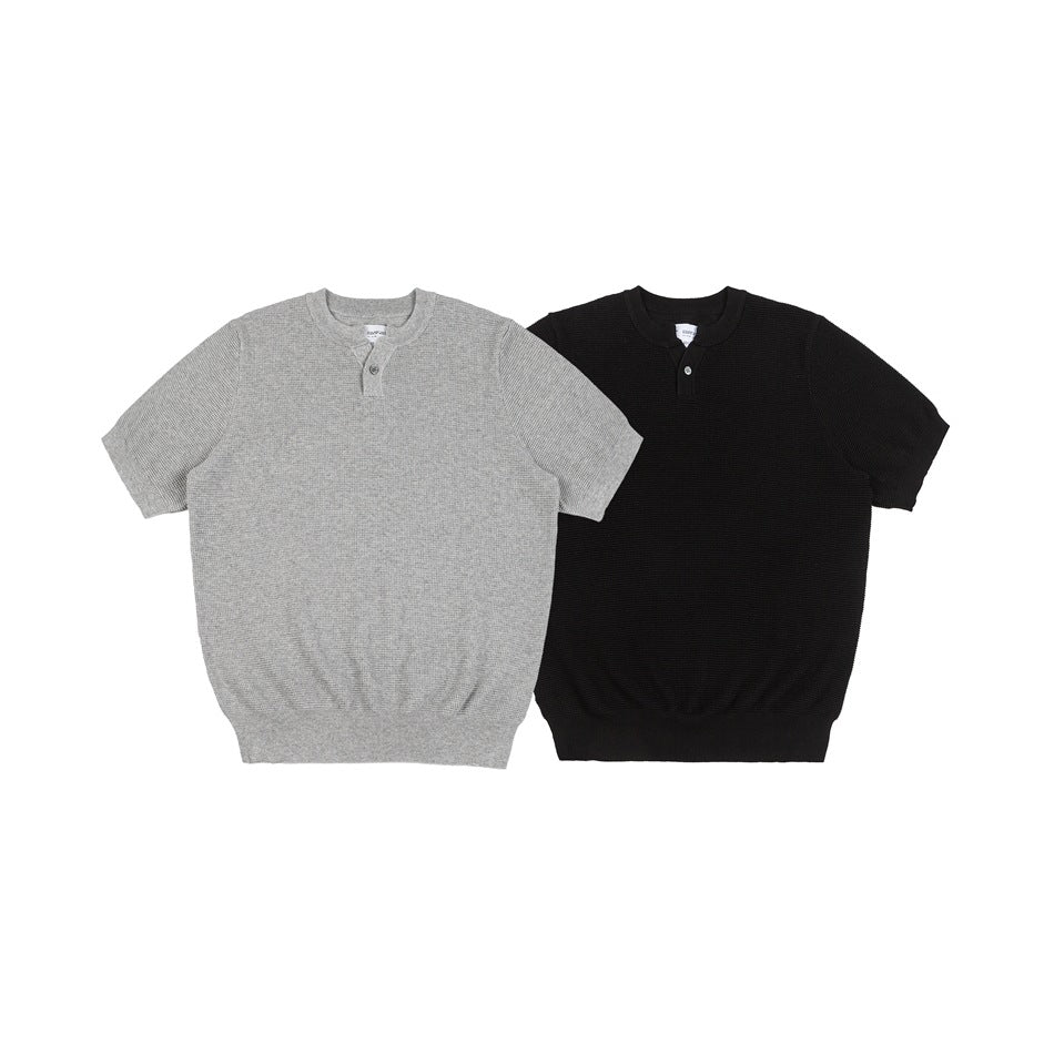 Front view of gray and black short-sleeve knit Henley tops with ribbed collars, cuffs, and hems.