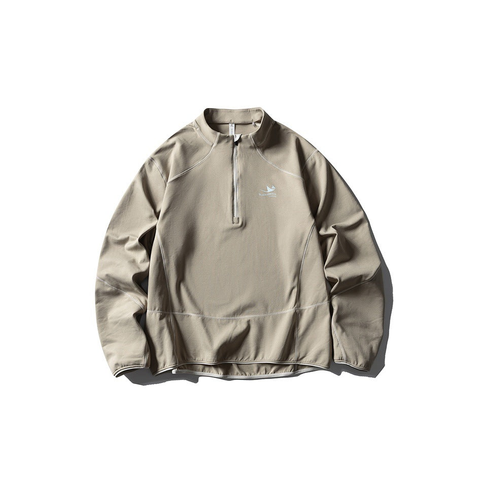 Khaki half-zip pullover flat lay with stand collar and tonal light stitching