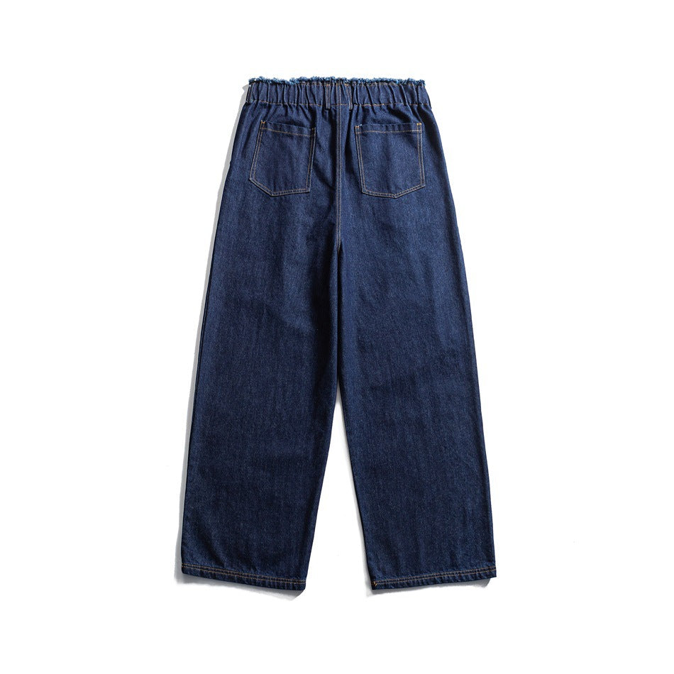Back of blue wide-leg denim jeans with two patch pockets and elastic frayed waistband