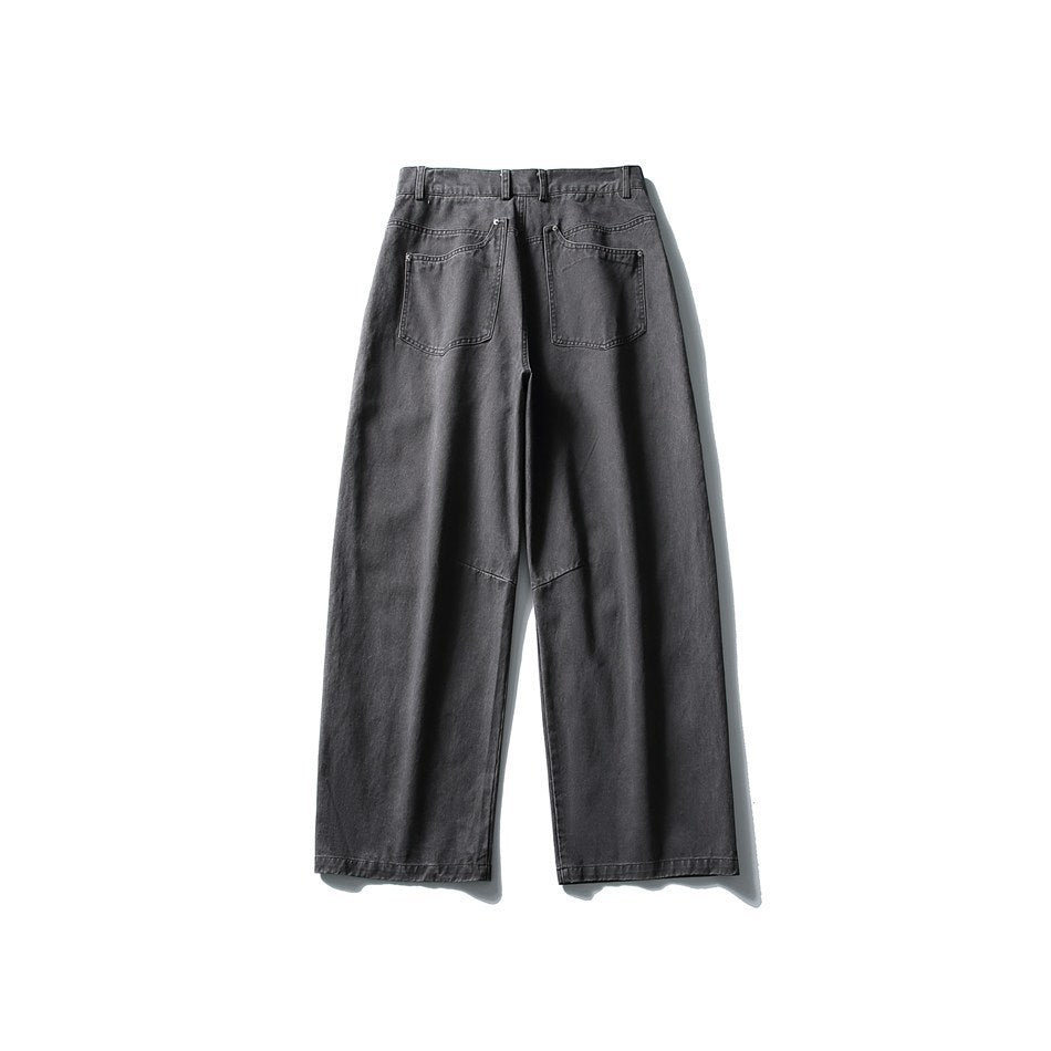Back view of charcoal gray wide-leg pants laid flat, with belt loops and two rear pockets.