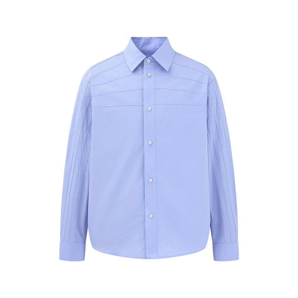 Light blue long-sleeve button-up shirt, front flat view, with pointed collar, chest seam lines and pleated sleeves