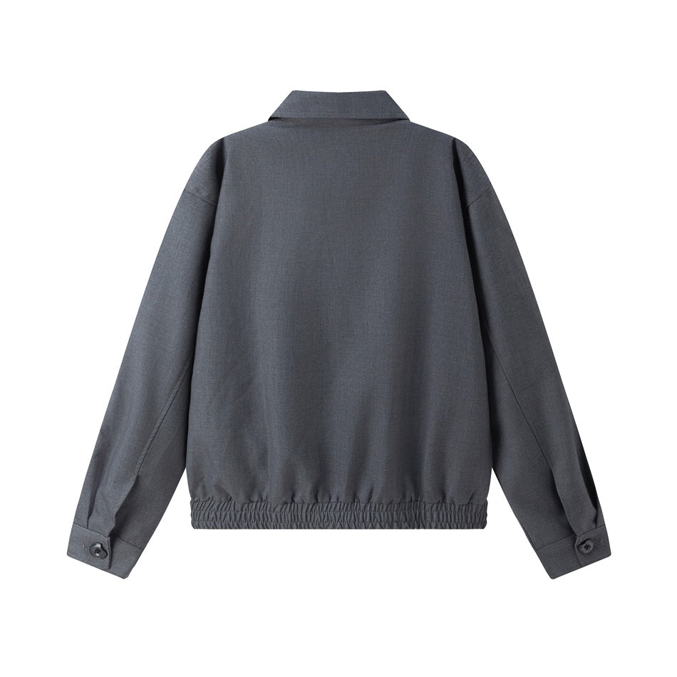 Flat back view of a gray jacket with a pointed collar, long sleeves, buttoned cuffs, and elastic hem.