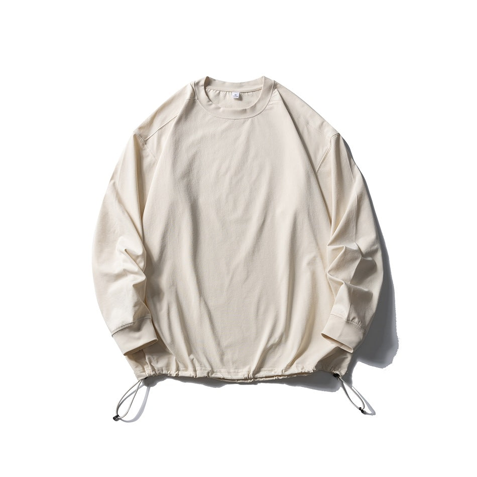 Sand beige long-sleeve crew-neck top flat lay with drawstring hem and toggle cords
