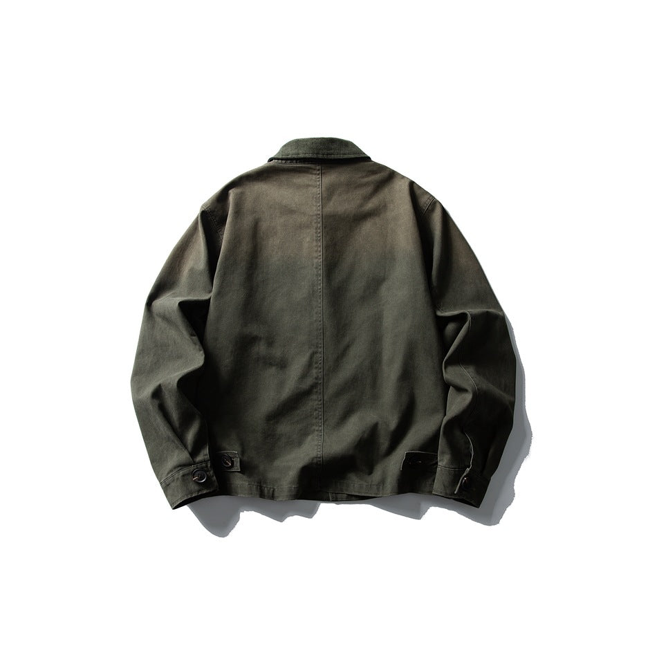 Back view of moss green jacket showing center back seam, ribbed collar and button tabs at the hem