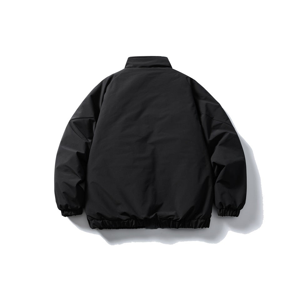 Back view of a black jacket with a stand collar, long sleeves, and gathered cuffs and hem.