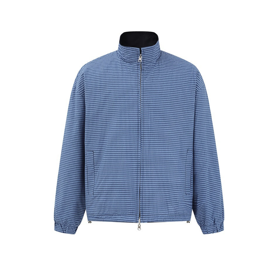 Front view of a blue and black checked zip jacket with a black stand collar, side pockets, and gathered cuffs.
