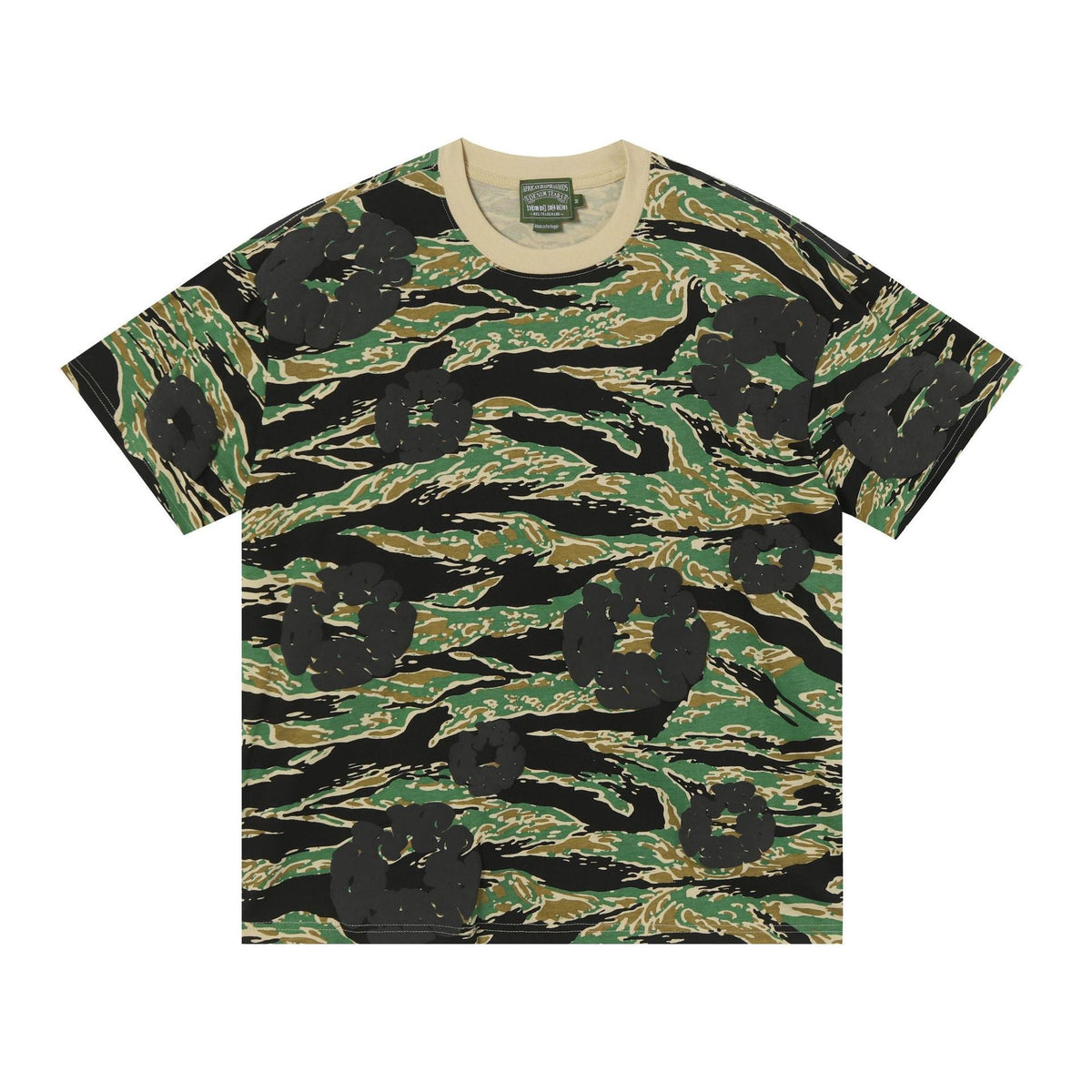 Denim Tears green tiger stripe camouflage all-over print cotton T-shirt with beige ribbed crew neck, laid flat on white background