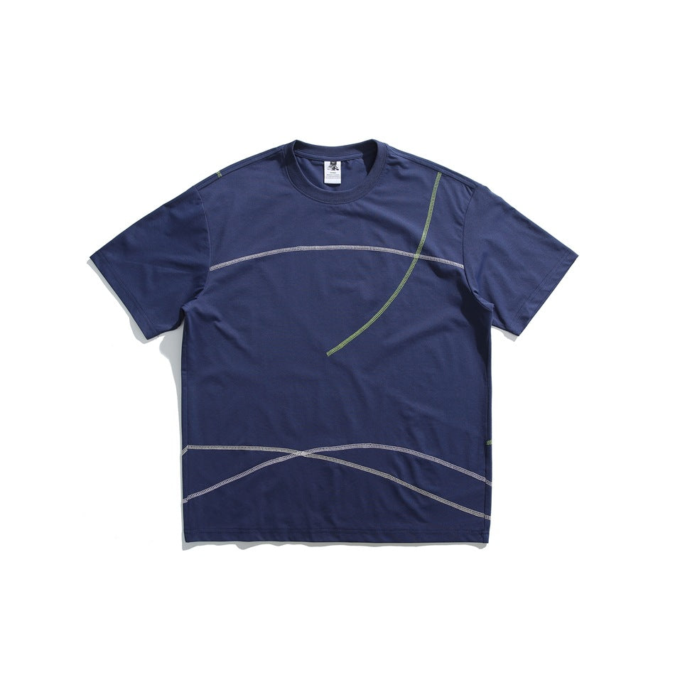 Navy short-sleeve crew-neck T-shirt with white and green contrast curved topstitching, front view