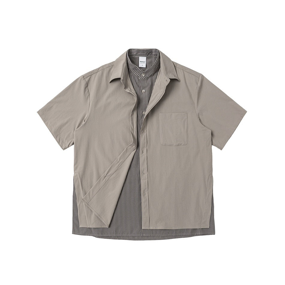 Taupe short-sleeve button-up shirt shown open to reveal a dark vertically striped inner layer and chest pocket.
