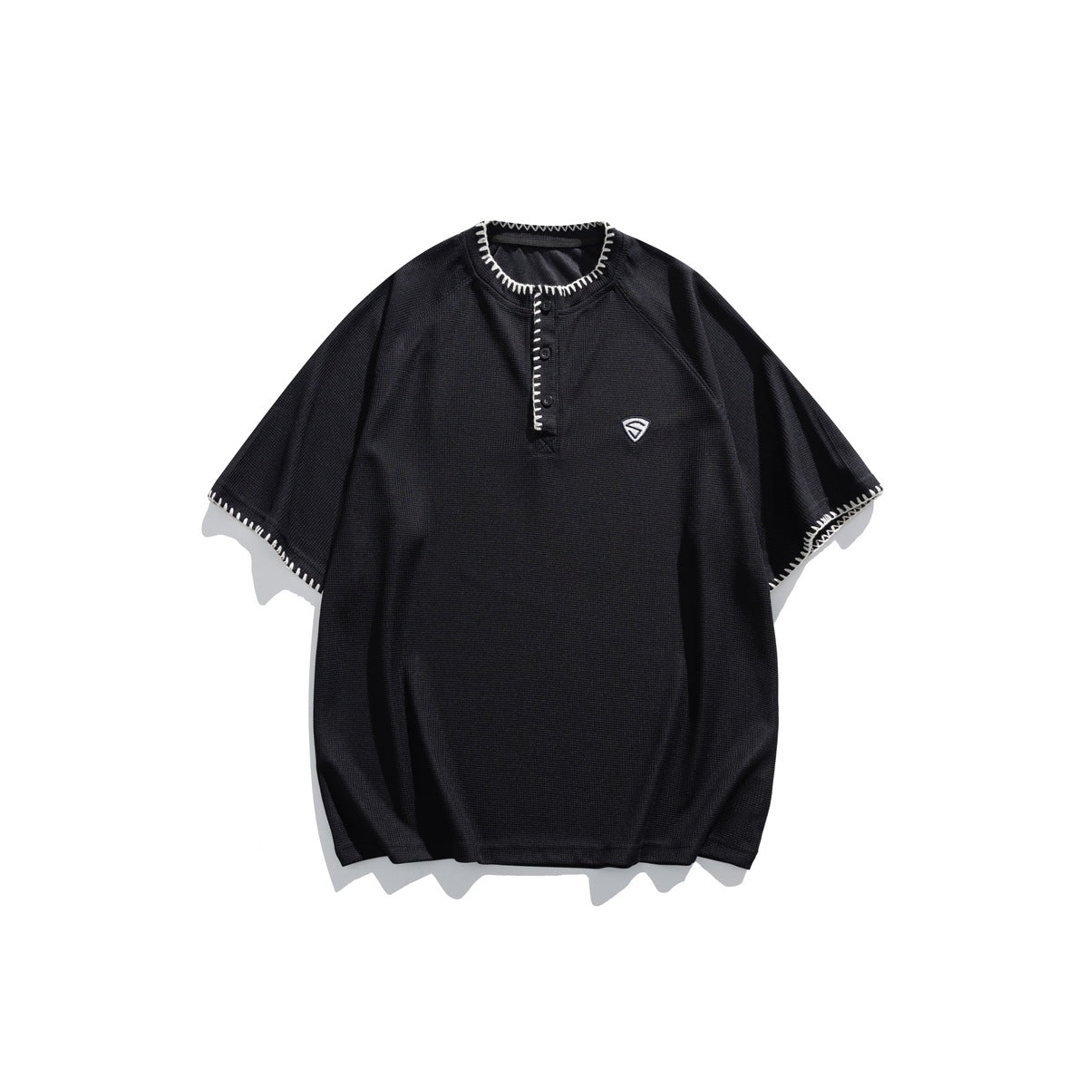 Black short-sleeve Henley T-shirt with white whipstitch trim and a small embroidered emblem, flat lay front view