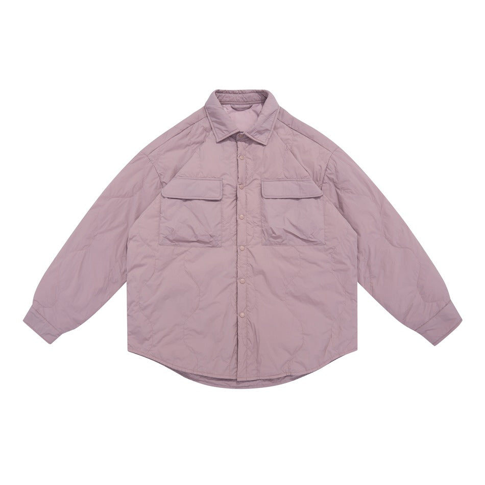 Dusty pink quilted shirt-style jacket with flap chest pockets and snap front, flat lay