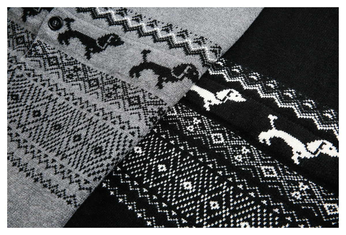 Close-up of gray and black knit cardigans with dog motifs and geometric pattern bands.