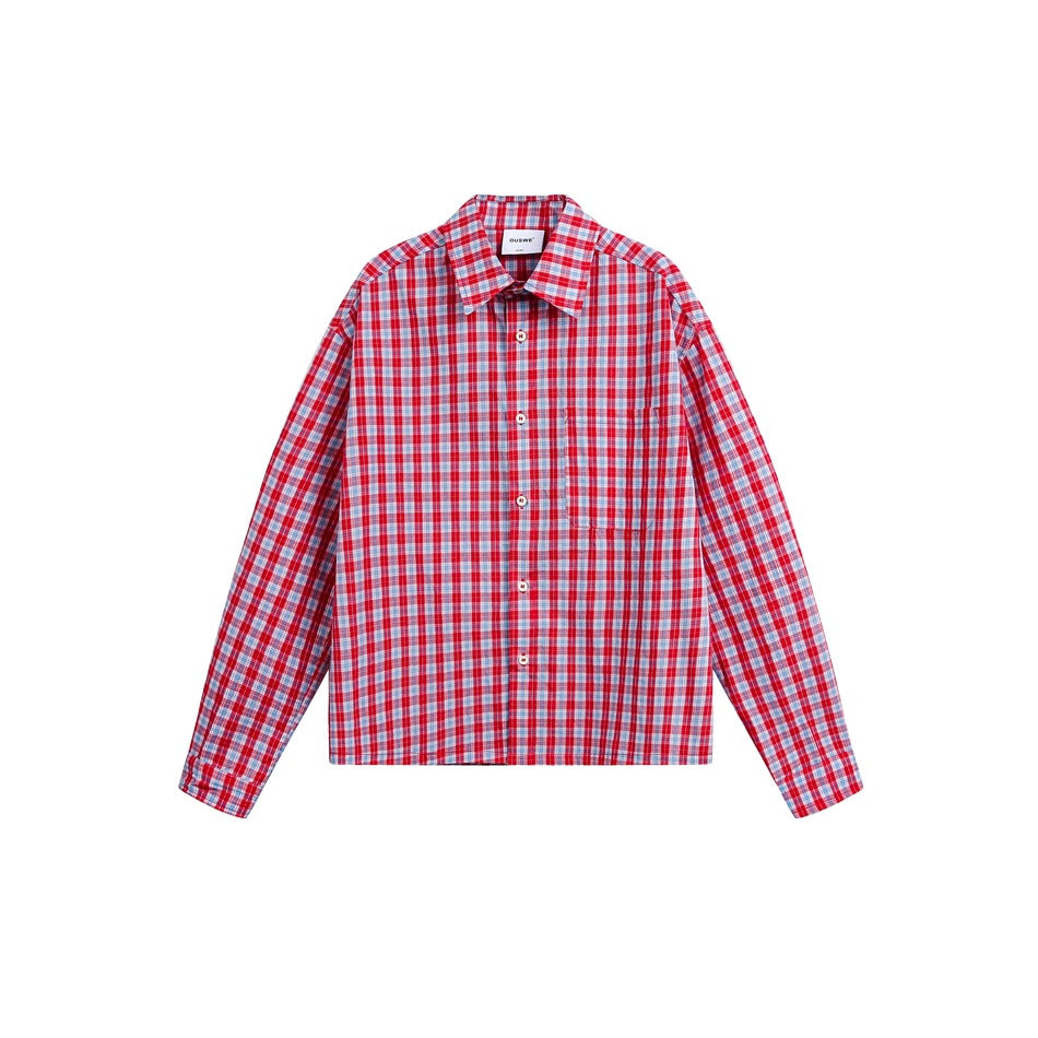 Red, light blue and white plaid long-sleeve button-up shirt with chest pocket, flat front view on white