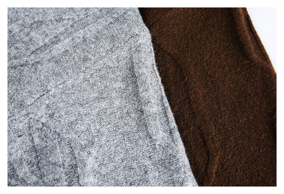 Close-up of gray and dark brown knit garment sections showing their textured stitches.