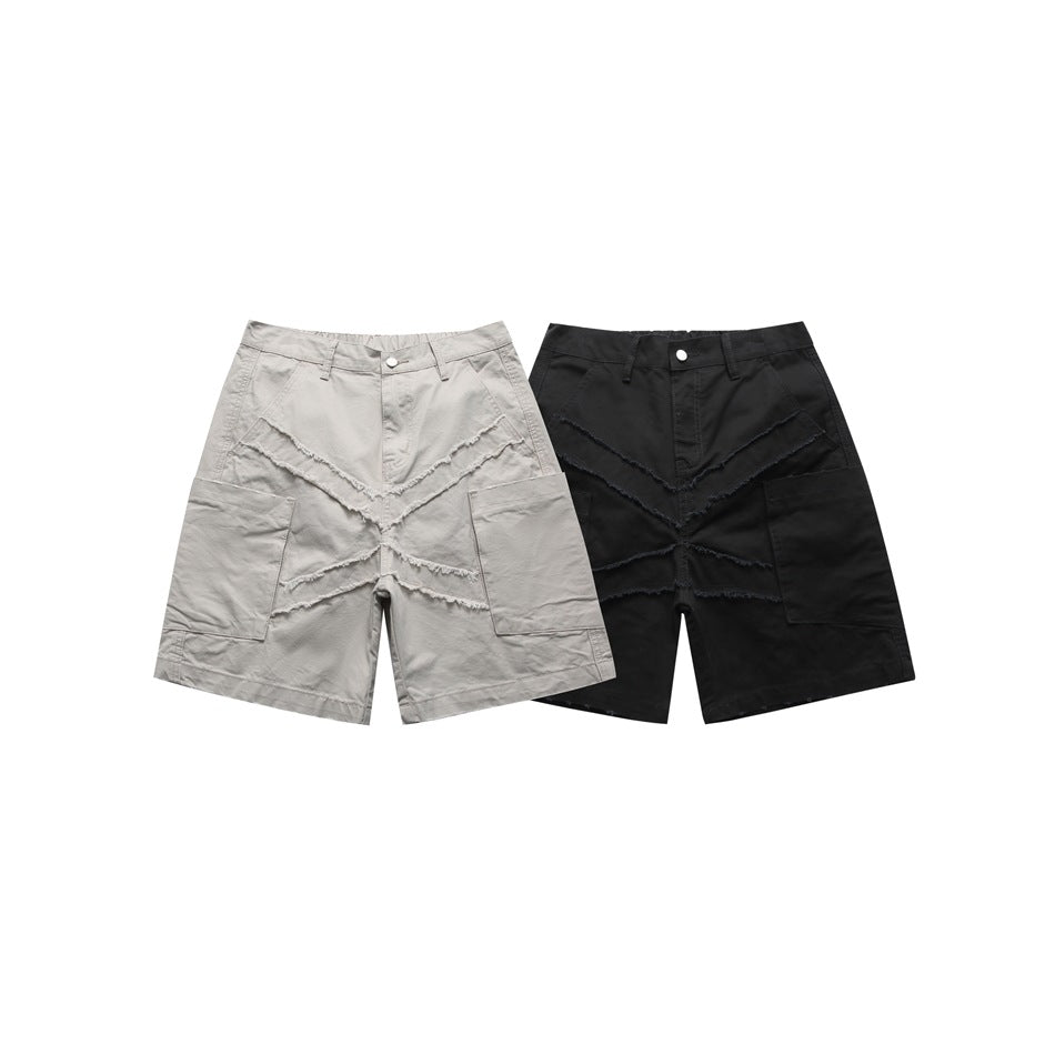 Front view of two utility shorts, one light gray and one black, with large pockets and frayed seam accents.