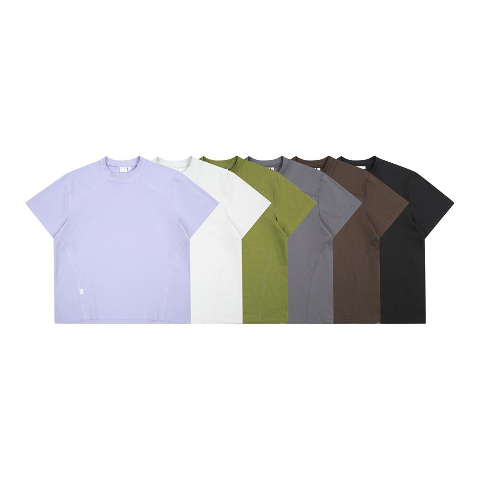 Six short-sleeve T-shirts displayed together in lavender, white, olive, gray, brown, and black.