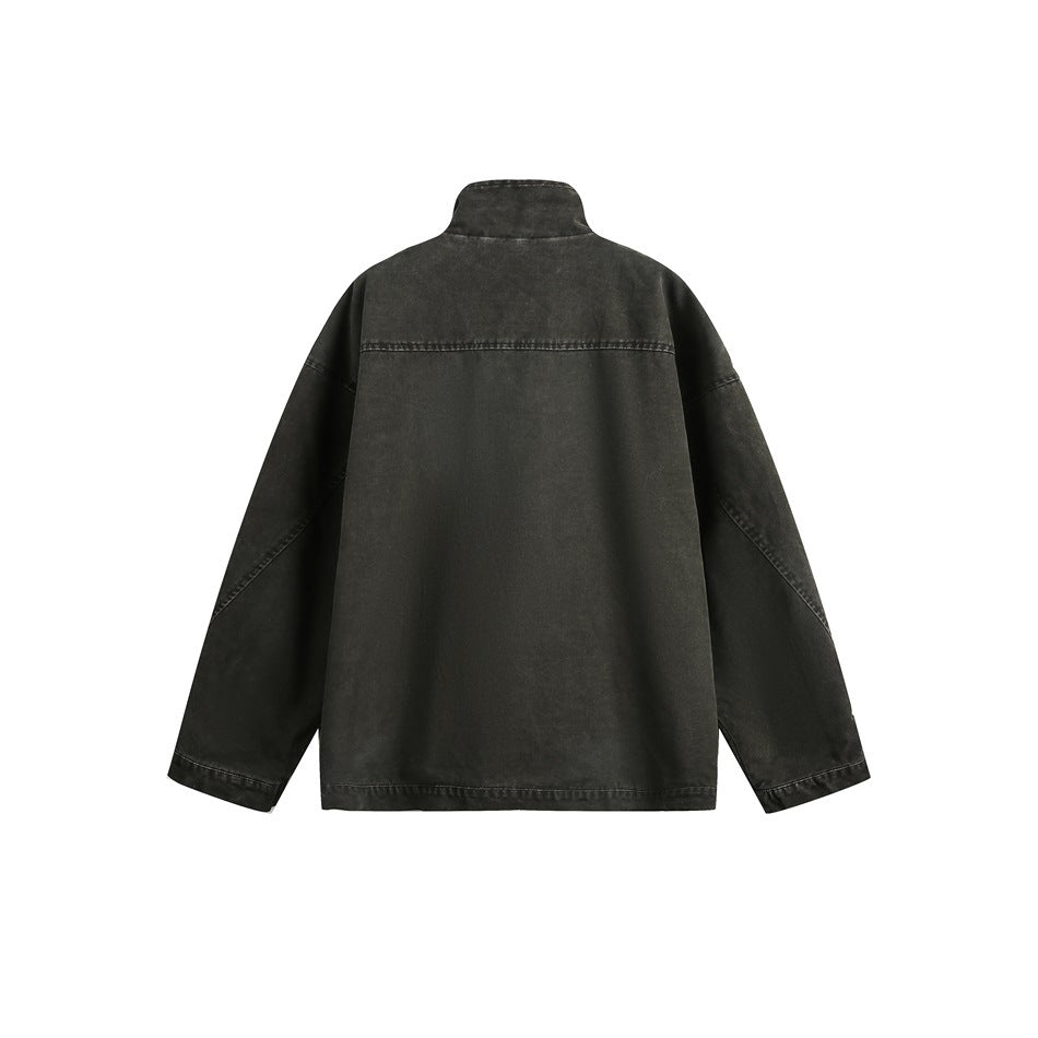 Back view of a dark charcoal jacket with a stand collar, dropped shoulders and a horizontal upper-back seam.