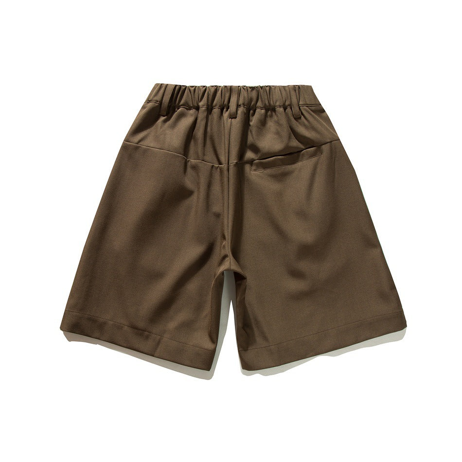 Back view of dark brown knee-length shorts with a gathered waistband and two rear pockets.