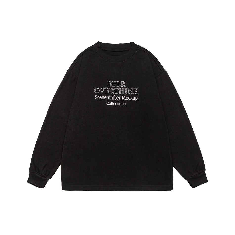 Black long-sleeve crew neck sweatshirt flat lay with white chest lettering and ribbed cuffs