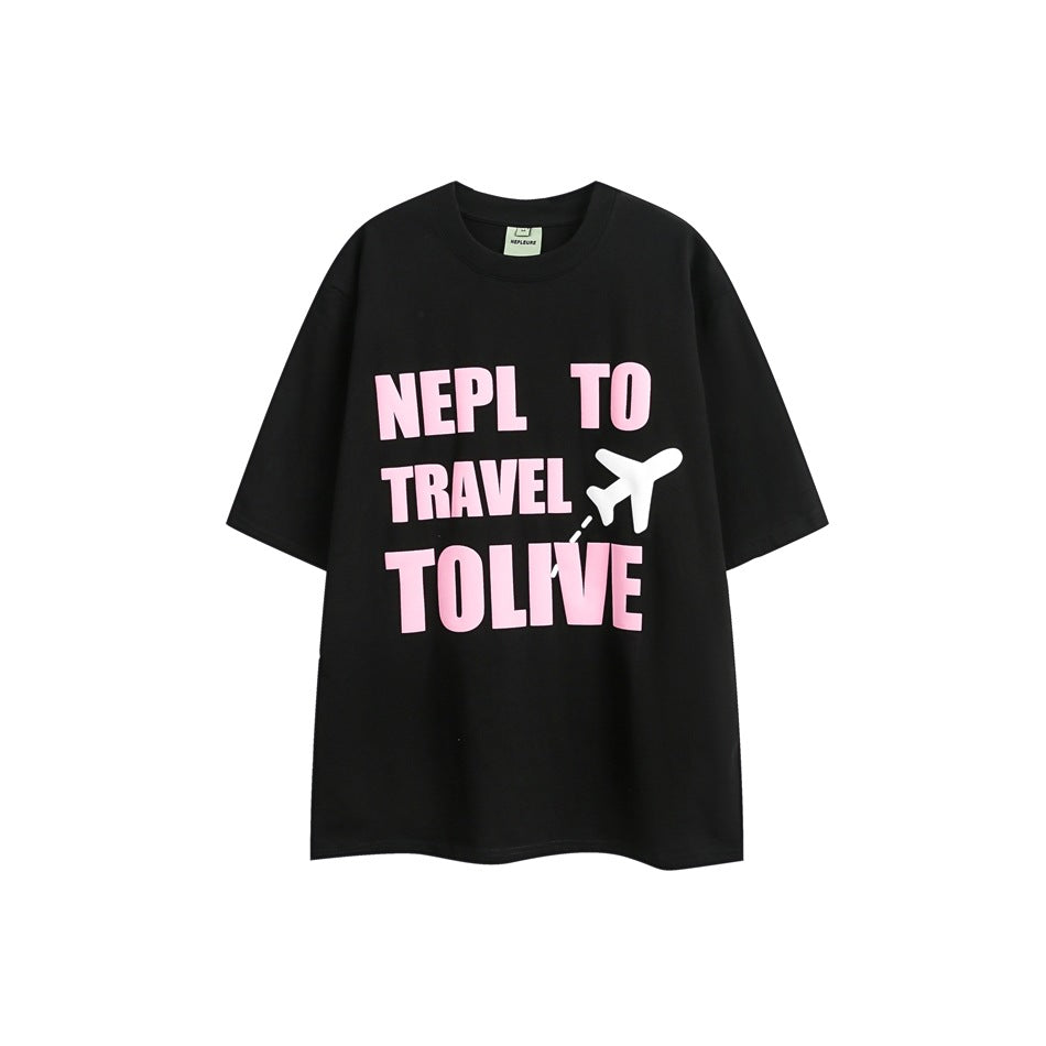 Black short-sleeve crew-neck T-shirt with pink block-letter travel graphic and white airplane, front view