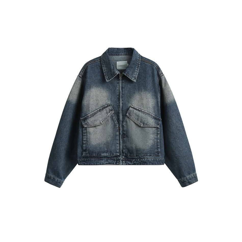 Washed blue cropped denim jacket flat view with collar, front zip and two large flap pockets