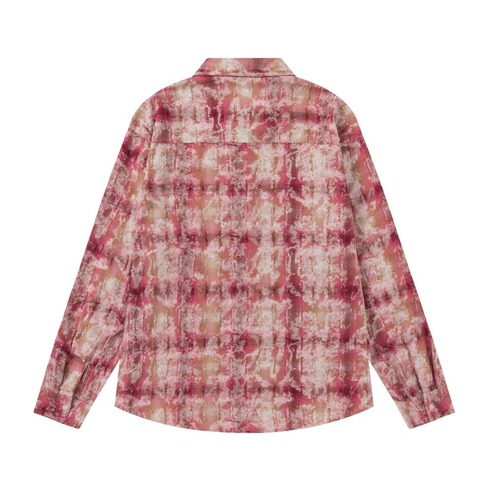 Back view of a long-sleeve button-up shirt in a distressed abstract pattern of pink, cream and muted tan.