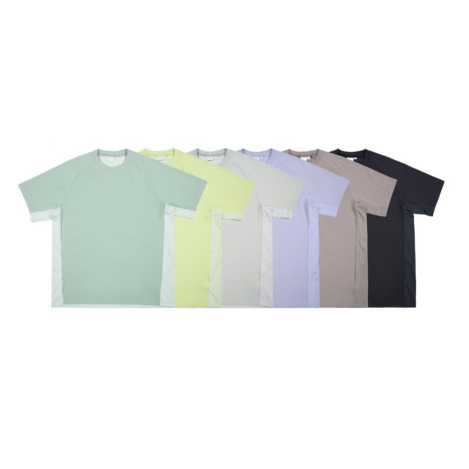 Six short-sleeve crew-neck T-shirts displayed together in mint, lime, gray, lavender, taupe, and black.