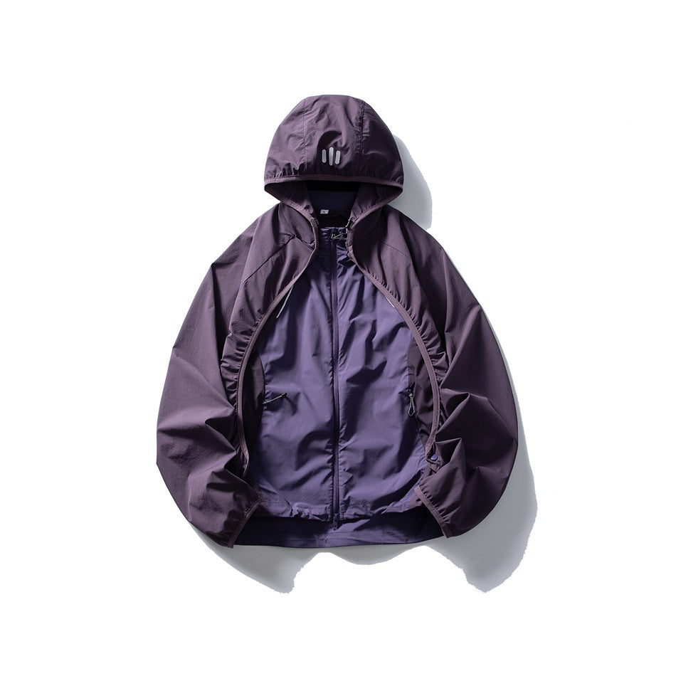 Purple hooded zip jacket flat lay with overlapping sleeve panels over a lighter purple inner layer