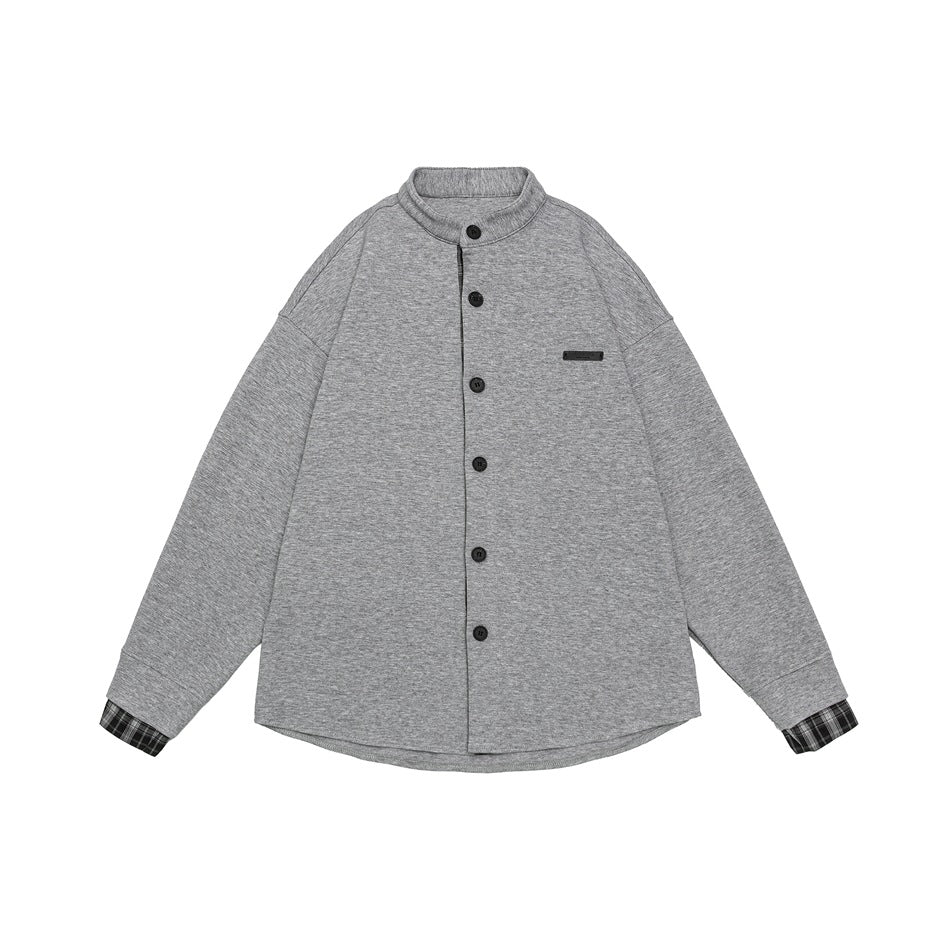 Heathered gray button-front stand-collar jacket with plaid cuffs and chest tab, flat lay front view