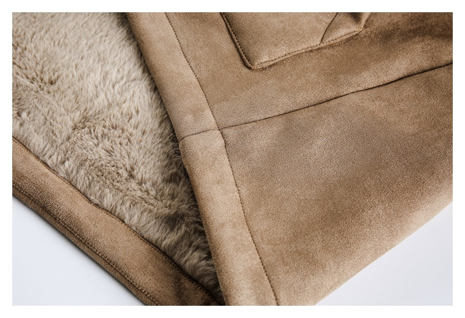 Close-up of the tan jacket's pale plush lining, edge stitching, and outer panel.