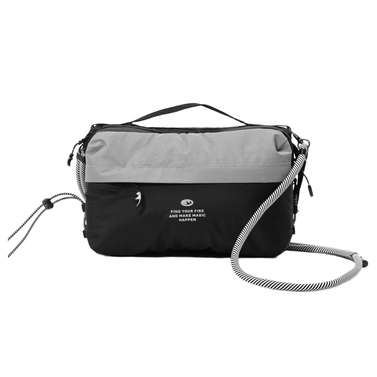 Black crossbody bag with gray upper panel, top handle and black-and-white striped cord strap