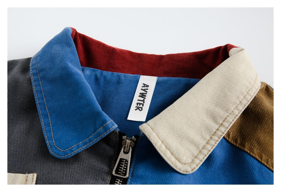 Close-up of the jacket's multicolor collar, zipper, and sewn neck label.