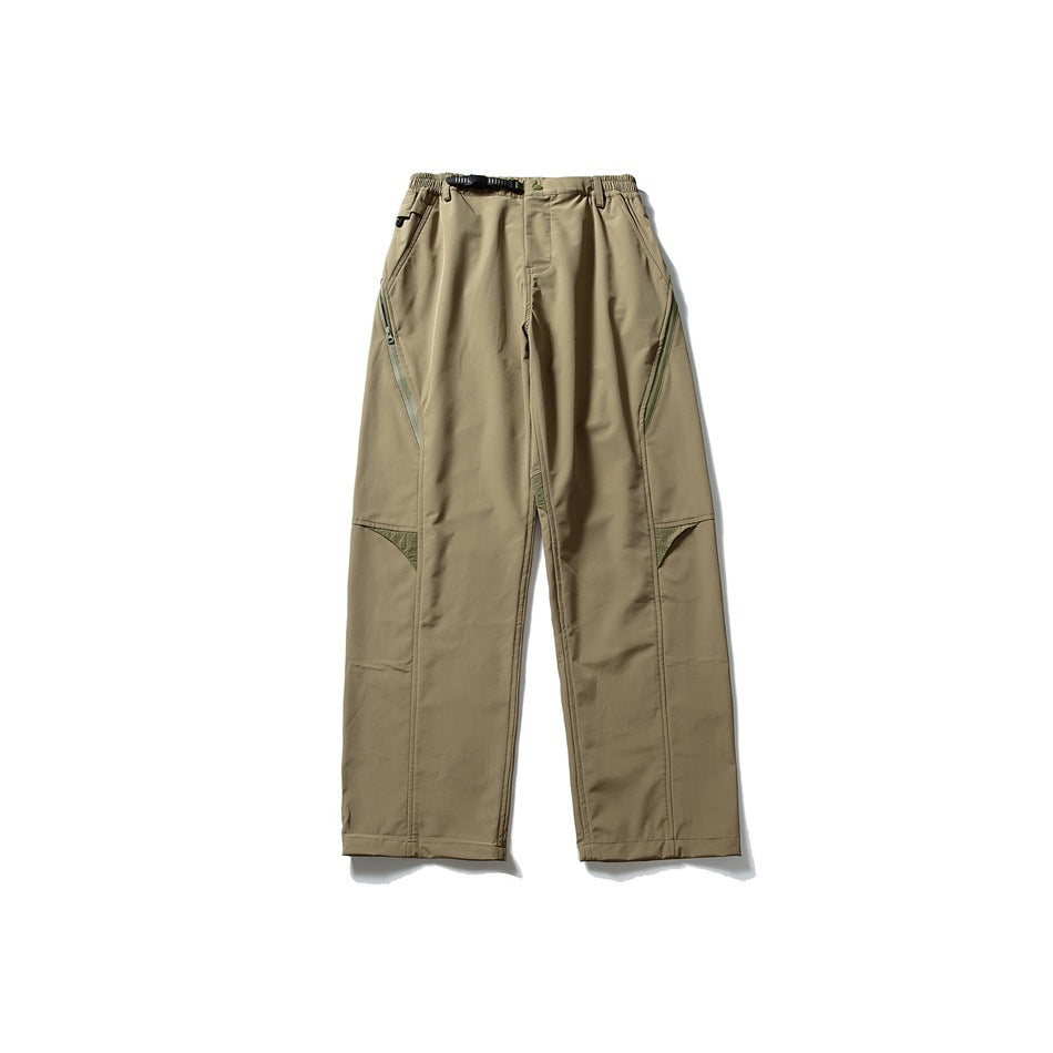 Khaki wide-leg pants with olive zipper and knee panel accents, belt buckle and elastic waist, laid flat